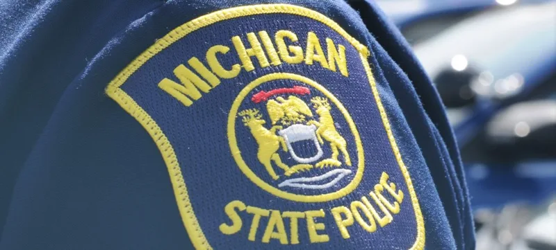 Driver charged after seriously injuring two bystanders